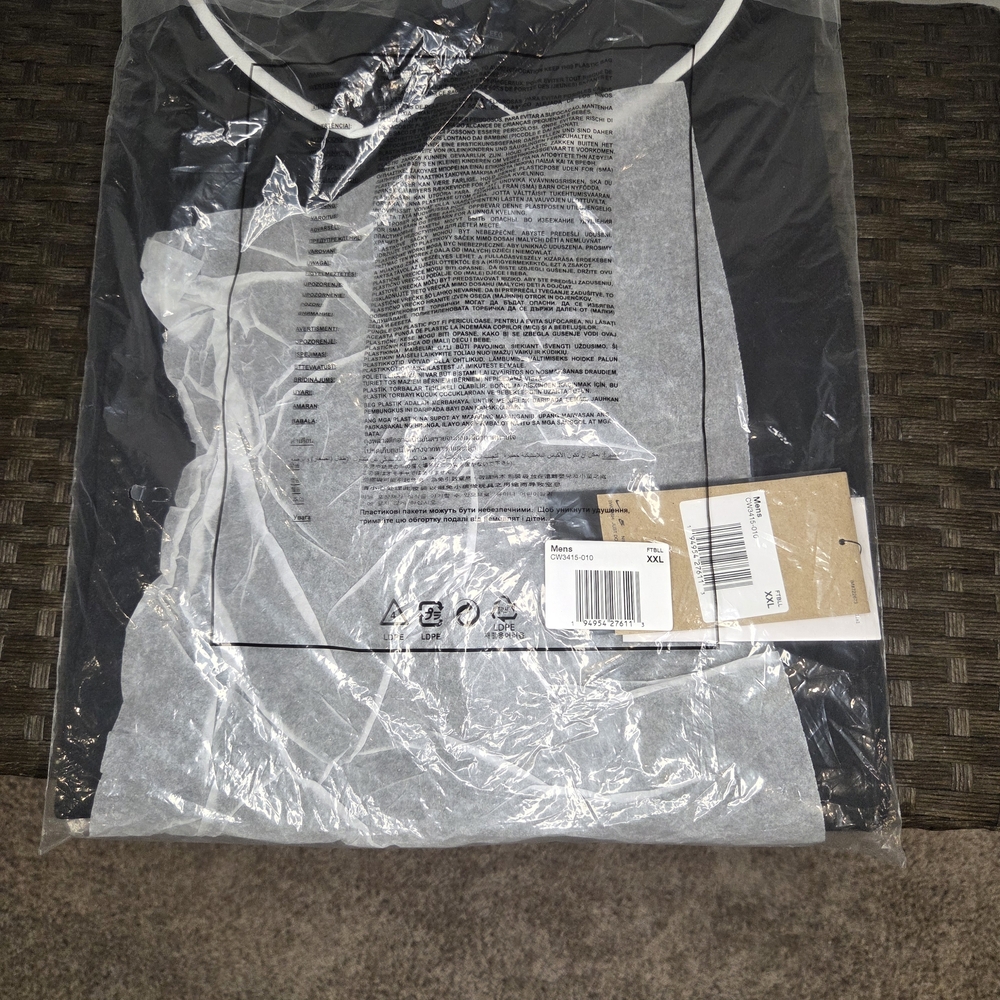 Nike Black and White Men's Polo Shirt